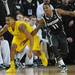 Michigan sophomore Trey Burke smiles after stealing the ball from Michigan State junior Keith Appling during the last seconds of the second half to secure a 58-57 win over Michigan State at Crisler Center on Sunday, March 3, 2013. Melanie Maxwell I AnnArbor.com